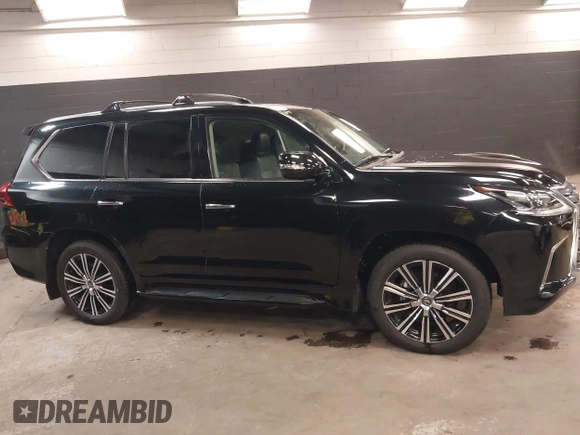 2021 Lexus LX 570 z VIN JTJDY7AX0M4352294, wystawiony jako IAAI lot #42341156 z przebiegiem 18 398 mil mil oraz . Historia ofert i sprzedaży dostępna na DreamBid. Obrazek 13.