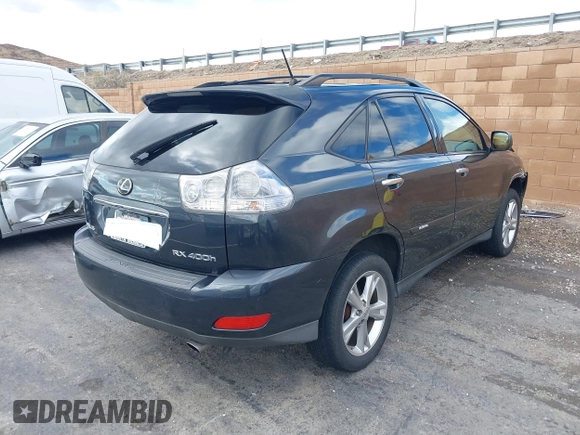 2008 Lexus RX 400h with VIN JTJGW31U382850234, listed as a IAAI auction lot 41556774 with 124,697 mi miles and . Bid and sale history available at DreamBid. Image 4.