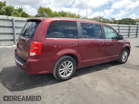 2019 Dodge Grand Caravan SXT with VIN 2C4RDGCGXKR807759, listed as a Copart auction lot 56098575 with 119,268 mi miles and Salvage Title. Bid and sale history available at DreamBid. Image 3.
