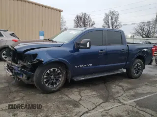 2018 Nissan Titan Pro-4X z VIN 1N6AA1E55JN505223, wystawiony jako Copart lot #85542844 z przebiegiem 113 601 mil mil oraz Szkoda całkowita • Salvage title. Historia ofert i sprzedaży dostępna na DreamBid. Obrazek 1.
