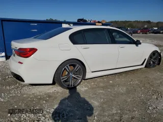 2016 BMW 7 Series 750i with VIN WBA7F0C56GGL99161, listed as a Copart auction lot 87652655 with 97,805 mi miles and Salvage Title. Bid and sale history available at carsss.com. Image 3.