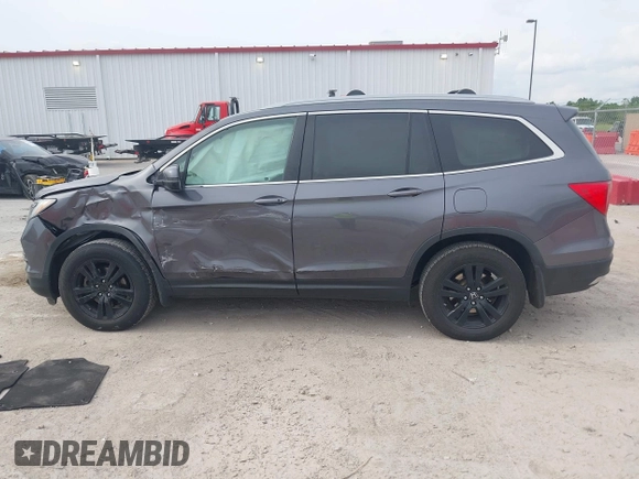 2017 Honda Pilot EX-L with VIN 5FNYF6H53HB038128, listed as a IAAI auction lot 42300311 with 176,928 mi miles and . Bid and sale history available at DreamBid. Image 14.