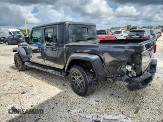2023 Jeep Gladiator Overland with VIN 1C6HJTFG5PL560876, listed as a Copart auction lot 63239105 with 51,205 mi miles and Clean title. Bid and sale history available at DreamBid. Image 2.