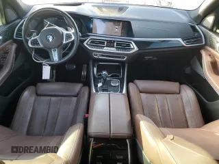 2020 BMW X5 M50i with VIN 5UXJU4C01LLE45993, listed as a Copart auction lot 88904235 with 64,841 mi miles and Salvage Title. Bid and sale history available at DreamBid. Image 8.