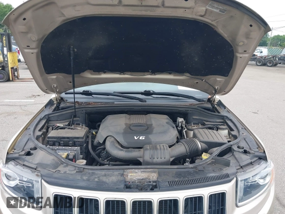 2014 Jeep Grand Cherokee Limited z VIN 1C4RJFBG8EC408754, wystawiony jako IAAI lot #42612211 z przebiegiem 149 017 mil mil oraz . Historia ofert i sprzedaży dostępna na DreamBid. Obrazek 10.