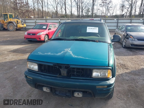 1997 Oldsmobile Bravada z VIN 1GHDT13W9V2705528, wystawiony jako IAAI lot #41583837 z przebiegiem 284 281 mil mil oraz . Historia ofert i sprzedaży dostępna na DreamBid. Obrazek 6.