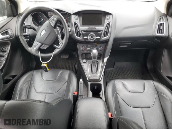 2017 Ford Focus Titanium with VIN 1FADP3J23HL218867, listed as a Copart auction lot 55417305 with 98,710 mi miles and Salvage title. Bid and sale history available at DreamBid. Image 8.