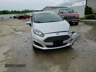 2016 Ford Fiesta SE z VIN 3FADP4BJXGM149197, wystawiony jako Copart lot #57100405 z przebiegiem 106 429 mil mil oraz Nie do naprawy • Non repairable. Historia ofert i sprzedaży dostępna na DreamBid. Obrazek 13.