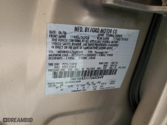 2007 Mercury Montego Premier with VIN 1MEHM43117G602649, listed as a Copart auction lot 45904565 with 102,621 mi miles and Salvage Title. Bid and sale history available at carsss.com. Image 14.