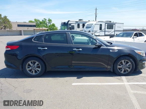 2016 Kia Optima LX Turbo with VIN 5XXGT4L12GG077169, listed as a IAAI auction lot 42108788 with 116,589 mi miles. Bid and sale history available at carsss.com. Image 13.