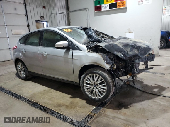 2017 Ford Focus Titanium с VIN 1FADP3N20HL274033, выставлен на аукционе Copart как лот 57295925 с пробегом Не указан миль и Списание • Salvage title. История ставок и продаж доступна на DreamBid. Изображение 4.