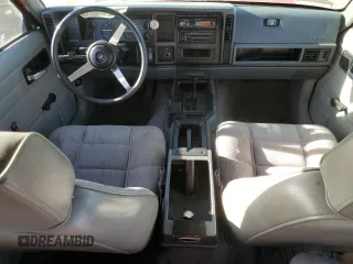 1994 Jeep Cherokee SE with VIN 1J4FJ28S7RL254870, listed as a Copart auction lot 85783884 with 268,569 mi miles and Salvage Title. Bid and sale history available at carsss.com. Image 8.