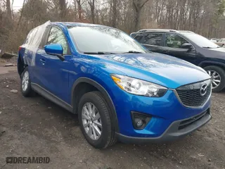 2013 Mazda CX-5 Touring with VIN JM3KE4CE0D0160711, listed as a IAAI auction lot 41843658 with 65,391 mi miles. Bid and sale history available at carsss.com. Image 1.
