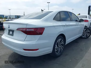2020 Volkswagen Jetta SEL z VIN 3VWEB7BU6LM037447, wystawiony jako IAAI lot #41905020 z przebiegiem 42 179 mil mil oraz . Historia ofert i sprzedaży dostępna na DreamBid. Obrazek 4.