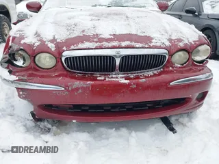 2003 Jaguar X-Type 2.5L Manual z VIN SAJEA51D63XC89273, wystawiony jako IAAI lot #41298544 z przebiegiem 124 400 mil mil oraz . Historia ofert i sprzedaży dostępna na DreamBid. Obrazek 18.