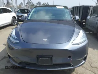 2022 Tesla Model Y Long Range z VIN 7SAYGDEE6NF364994, wystawiony jako IAAI lot #42322587 z przebiegiem 41 572 mil mil oraz . Historia ofert i sprzedaży dostępna na DreamBid. Obrazek 13.