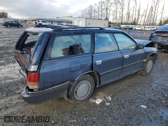 1993 Subaru Legacy L with VIN 4S3BJ6331P7949959, listed as a Copart auction lot 88360485 with 125,562 mi miles and Salvage Title. Bid and sale history available at DreamBid. Image 3.
