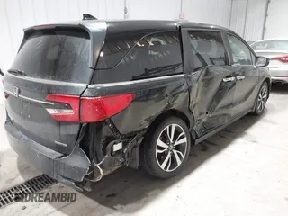 2023 Honda Odyssey Touring z VIN 5FNRL6H85PB039450, wystawiony jako IAAI lot #41504351 z przebiegiem 51 000 mil mil oraz . Historia ofert i sprzedaży dostępna na DreamBid. Obrazek 4.