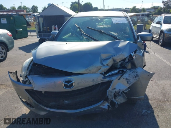 2012 Mazda 5 Sport with VIN JM1CW2BLXC0129303, listed as a IAAI auction lot 42556899 with 200,863 mi miles and . Bid and sale history available at DreamBid. Image 13.