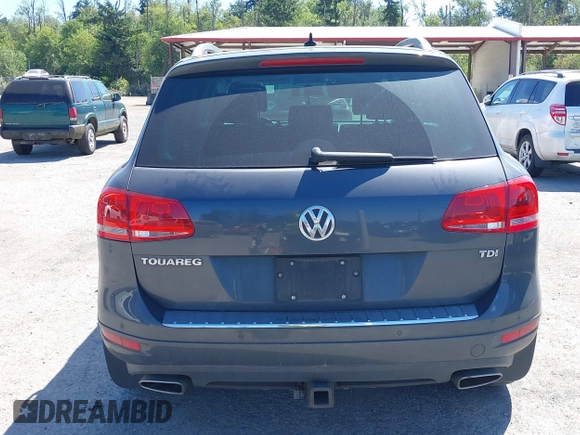 2012 Volkswagen Touareg Sport with VIN WVGFK9BP0CD004951, listed as a IAAI auction lot 42724125 with 173,993 mi miles and . Bid and sale history available at DreamBid. Image 16.