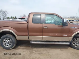2011 Ford F-150 XL with VIN 1FTFX1ET9BKD67310, listed as a IAAI auction lot 42016119 with 147,114 mi miles. Bid and sale history available at carsss.com. Image 13.