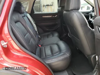 2019 Mazda CX-5 Grand Touring with VIN JM3KFADM2K1657915, listed as a Copart auction lot 56647145 with 85,095 mi miles and Salvage title. Bid and sale history available at DreamBid. Image 11.