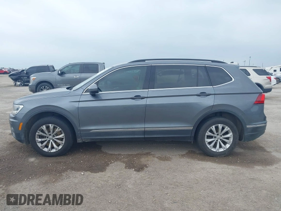 2018 Volkswagen Tiguan SEL with VIN 3VV3B7AX3JM000585, listed as a IAAI auction lot 41905836 with 99,114 mi miles and . Bid and sale history available at DreamBid. Image 14.