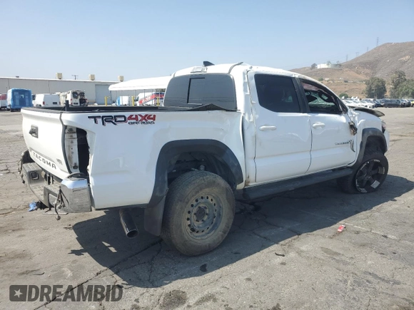 2017 Toyota Tacoma SR5 with VIN 3TMCZ5AN7HM065026, listed as a Copart auction lot 60438365 with 122,329 mi miles and Salvage title. Bid and sale history available at DreamBid. Image 3.