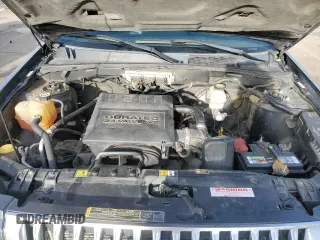 2009 Mercury Mariner z VIN 4M2CU91G49KJ04729, wystawiony jako Copart lot #49729105 z przebiegiem 235 117 mil mil oraz Szkoda całkowita • Salvage title. Historia ofert i sprzedaży dostępna na DreamBid. Obrazek 13.