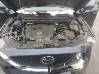2021 Mazda CX-5 Grand Touring with VIN JM3KFBDM0M0391325, listed as a Copart auction lot 44863215 with 21,997 mi miles and Salvage Title. Bid and sale history available at DreamBid. Image 14.