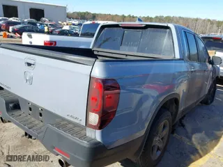 2023 Honda Ridgeline RTL with VIN 5FPYK3F54PB043891, listed as a IAAI auction lot 41164618 with 1 mi miles. Bid and sale history available at carsss.com. Image 4.