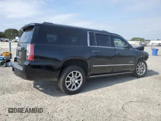 2015 GMC Yukon XL Denali with VIN 1GKS2JKJ5FR243343, listed as a Copart auction lot 51352125 with 142,996 mi miles and Salvage Title. Bid and sale history available at DreamBid. Image 3.
