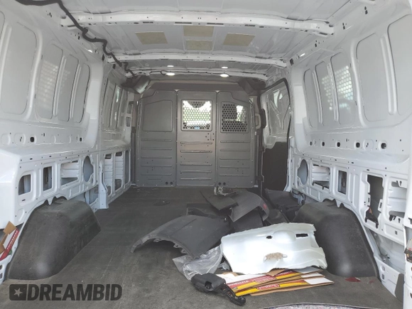 2023 Ford Transit with VIN 1FTBW1YG7PKB75200, listed as a Copart auction lot 60850425 with 59,145 mi miles and Salvage title. Bid and sale history available at DreamBid. Image 11.