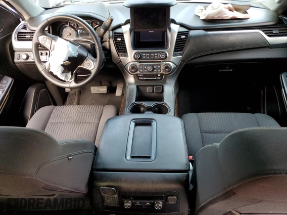 2019 Chevrolet Suburban LS с VIN 1GNSKGKC0KR321738, выставлен на аукционе Copart как лот 77894554 с пробегом 80 612 миль миль и Списание • Salvage title. История ставок и продаж доступна на DreamBid. Изображение 8.