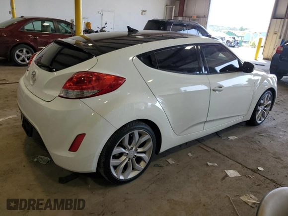 2015 Hyundai Veloster with VIN KMHTC6AD0FU236993, listed as a Copart auction lot 62411173 with 83,612 mi miles. Bid and sale history available at carsss.com. Image 3.