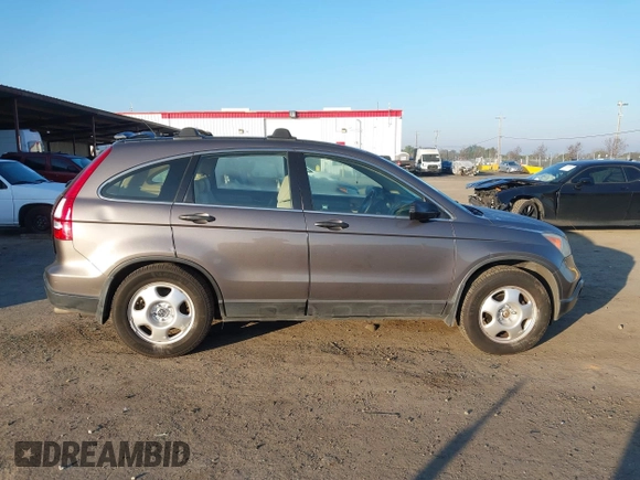 2009 Honda CR-V LX with VIN 5J6RE48389L011915, listed as a IAAI auction lot 41301796 with 214,807 mi miles. Bid and sale history available at carsss.com. Image 14.