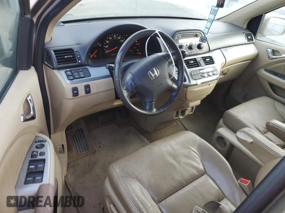 2009 Honda Odyssey EX-L with VIN 5FNRL38649B413532, listed as a Copart auction lot 79867014 with 308,701 mi miles and Salvage Title. Bid and sale history available at DreamBid. Image 8.