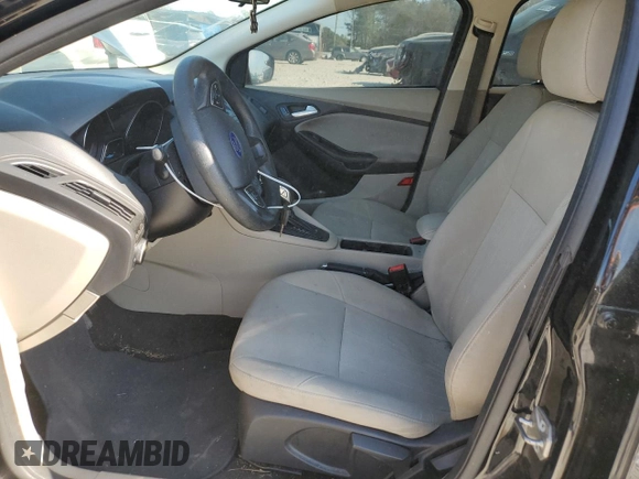 2017 Ford Focus SE with VIN 1FADP3F26HL331253, listed as a Copart auction lot 50869865 with 60,776 mi miles and Salvage title. Bid and sale history available at DreamBid. Image 7.
