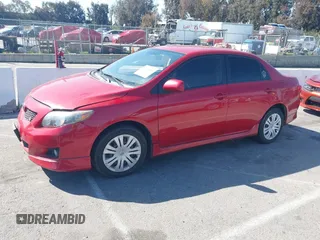 2009 Toyota Corolla with VIN 1NXBU40E59Z081868, listed as a IAAI auction lot 41763869 with 156,729 mi miles. Bid and sale history available at carsss.com. Image 2.