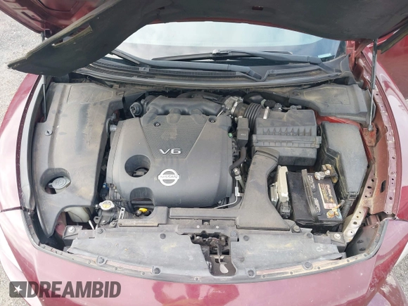 2013 Nissan Maxima S with VIN 1N4AA5APXDC846592, listed as a IAAI auction lot 42491159 with 113,189 mi miles and . Bid and sale history available at DreamBid. Image 10.