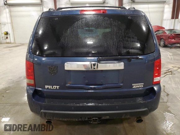 2009 Honda Pilot Touring z VIN 5FNYF48899B054320, wystawiony jako Copart lot #58948585 z przebiegiem 254 997 mil mil oraz Szkoda całkowita • Salvage title. Historia ofert i sprzedaży dostępna na DreamBid. Obrazek 6.