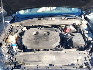 2015 Ford Fusion Titanium with VIN 3FA6P0D9XFR155040, listed as a IAAI auction lot 41423022 with 148,365 mi miles. Bid and sale history available at carsss.com. Image 10.