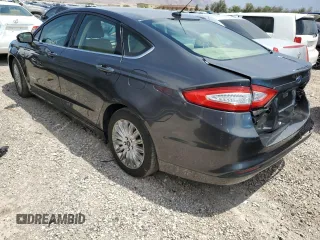 2016 Ford Fusion SE Hybrid with VIN 3FA6P0LU0GR406199, listed as a Copart auction lot 59146465 with 164,490 mi miles and Salvage title. Bid and sale history available at DreamBid. Image 2.