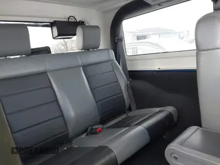 2010 Jeep Wrangler Sahara z VIN 1J4AA5D18AL170957, wystawiony jako IAAI lot #41599820 z przebiegiem 64 217 mil mil oraz . Historia ofert i sprzedaży dostępna na DreamBid. Obrazek 8.