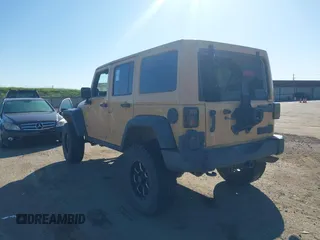 2013 Jeep Wrangler Unlimited Rubicon with VIN 1C4BJWFG3DL632668, listed as a IAAI auction lot 41751546 with 153,149 mi miles. Bid and sale history available at carsss.com. Image 3.