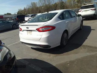 2016 Ford Fusion Titanium with VIN 3FA6P0K93GR347016, listed as a IAAI auction lot 41850780 with 215,872 mi miles and . Bid and sale history available at carsss.com. Image 4.
