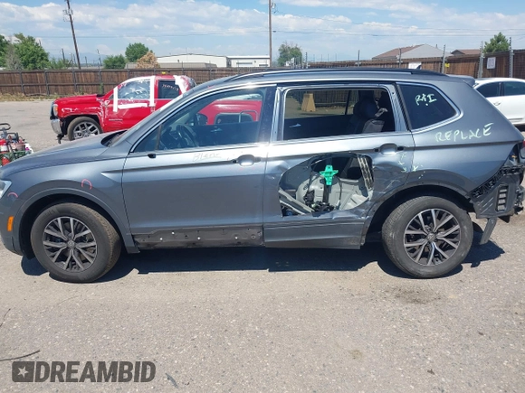2019 Volkswagen Tiguan SE with VIN 3VV2B7AX3KM143968, listed as a IAAI auction lot 39838788 with 155,823 mi miles and . Bid and sale history available at DreamBid. Image 14.