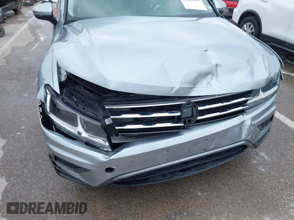 2019 Volkswagen Tiguan S with VIN 3VV1B7AX9KM110873, listed as a IAAI auction lot 42010931 with 82,745 mi miles and . Bid and sale history available at DreamBid. Image 6.