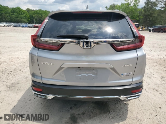 2020 Honda CR-V Touring z VIN 7FART6H94LE013557, wystawiony jako Copart lot #54605755 z przebiegiem 42 554 mil mil oraz Szkoda całkowita • Salvage title. Historia ofert i sprzedaży dostępna na DreamBid. Obrazek 6.
