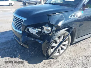 2012 Infiniti QX56 7-passenger z VIN JN8AZ2NE1C9017100, wystawiony jako IAAI lot #41654025 z przebiegiem 184 849 mil mil oraz . Historia ofert i sprzedaży dostępna na DreamBid. Obrazek 6.